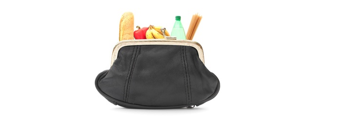 A wallet filled with groceries